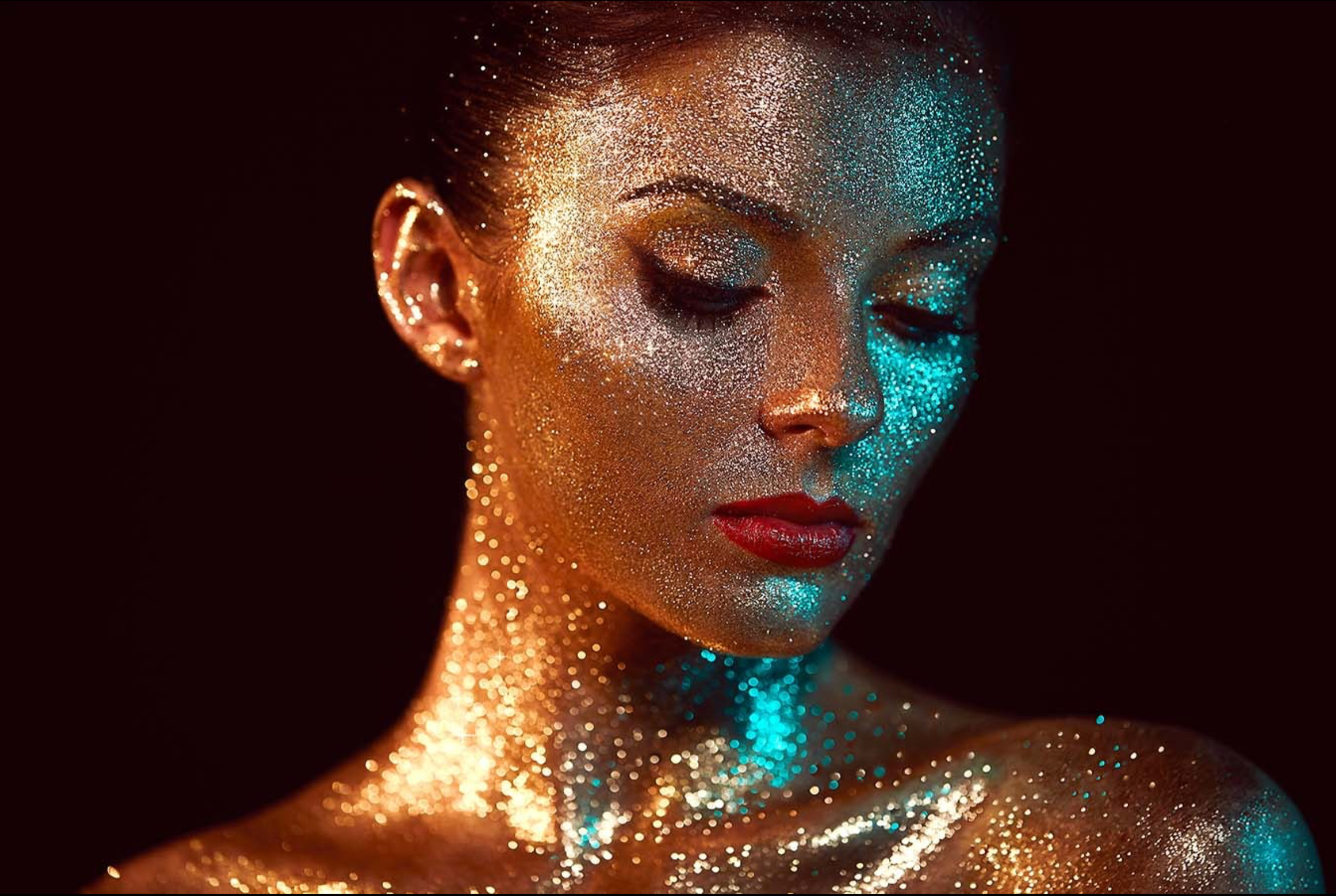 WOMAN WITH SPARKLES ON HER FACE