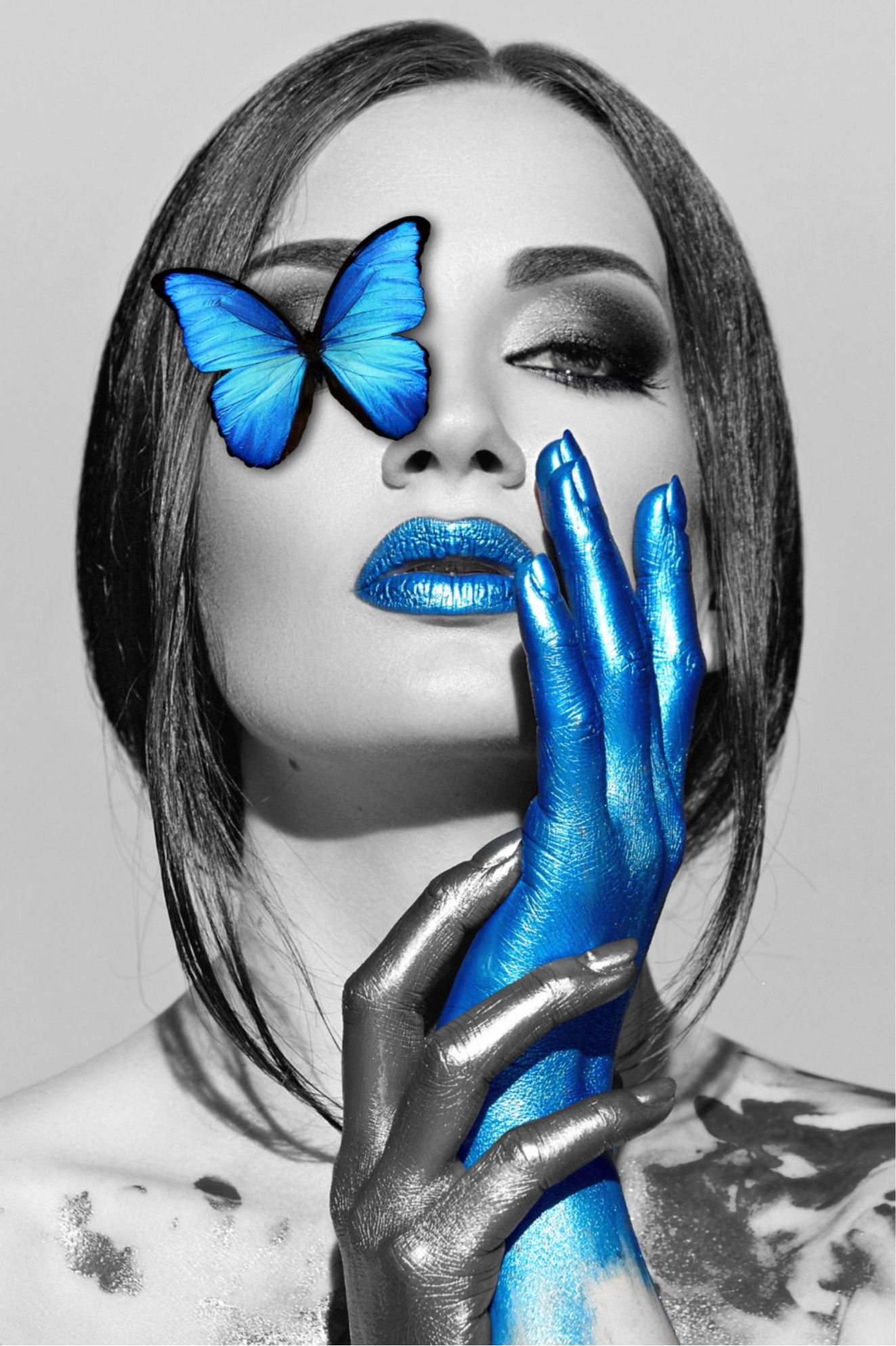 BLUE BUTTERFLY AND PAINT ON WOMEN FACE