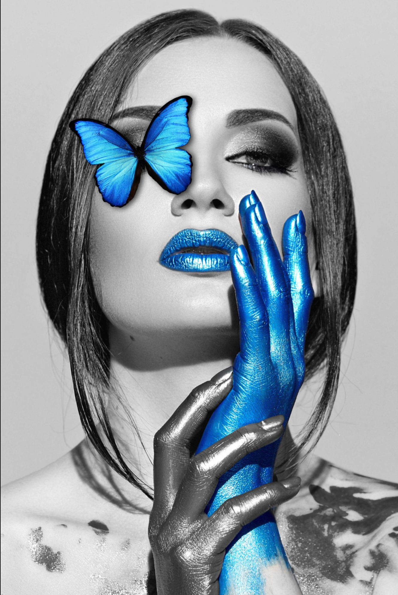 BLUE BUTTERFLY AND PAINT ON WOMEN FACE